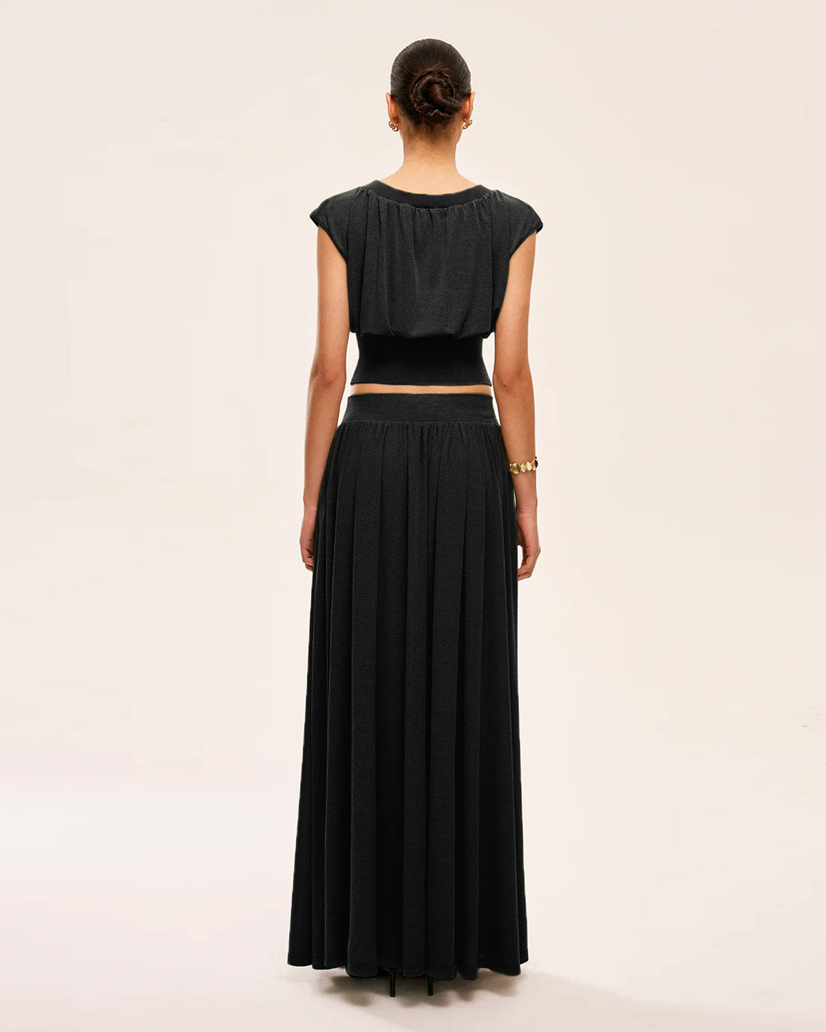 coord sets,bottomwear, topwear,casual chic, vacation, outdoor events, minimal, summer, urban fit, ,knitted,crepe,gathers,black,solid,fabric gathers,,,slim fit top,waist fitted top,waist length top,straight hem,crew neck,no straps ,short sleeves,cap sleeves,slip on,skirts,flare  skirt,full length,straight hem,mid rise waist,no pockets,OY3061, 25070030GG