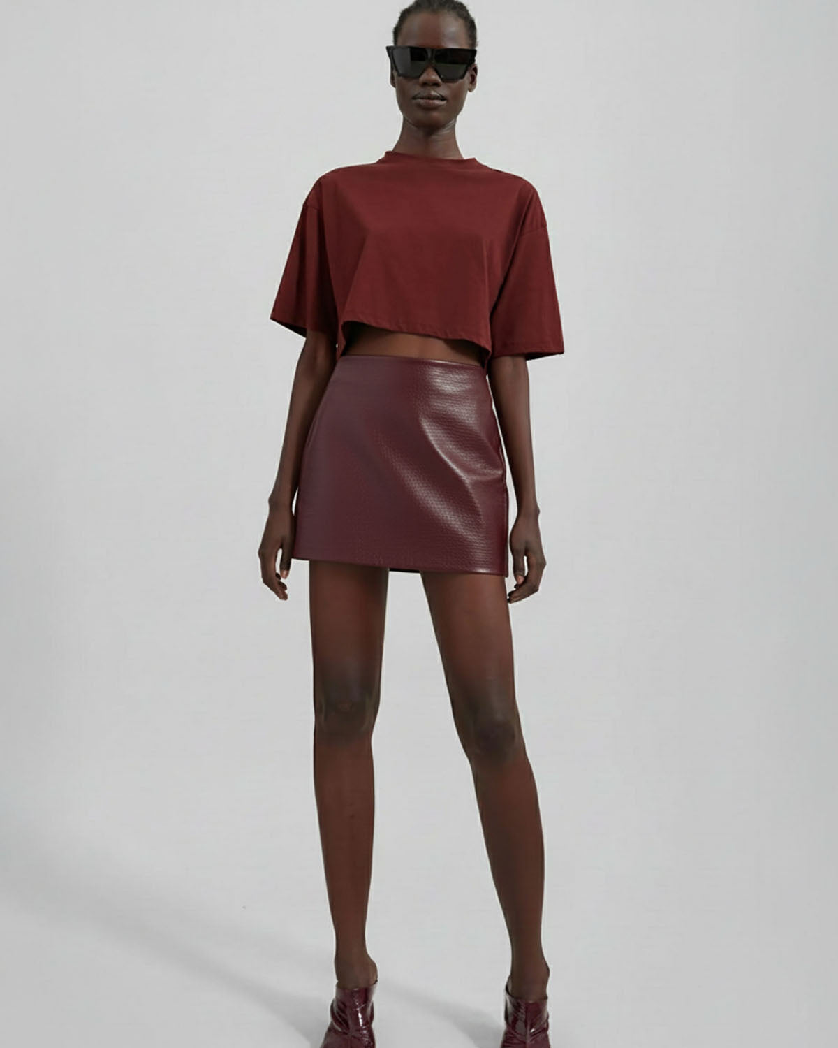 bottomwear,skirts,casual chic, outdoor events, party, vacation,gen z, summer,woven,pu leather,maroon,textured,zipper,a line fit,mini skirt,mini length,straight hem,mid rise, OY2230, 25090057GG