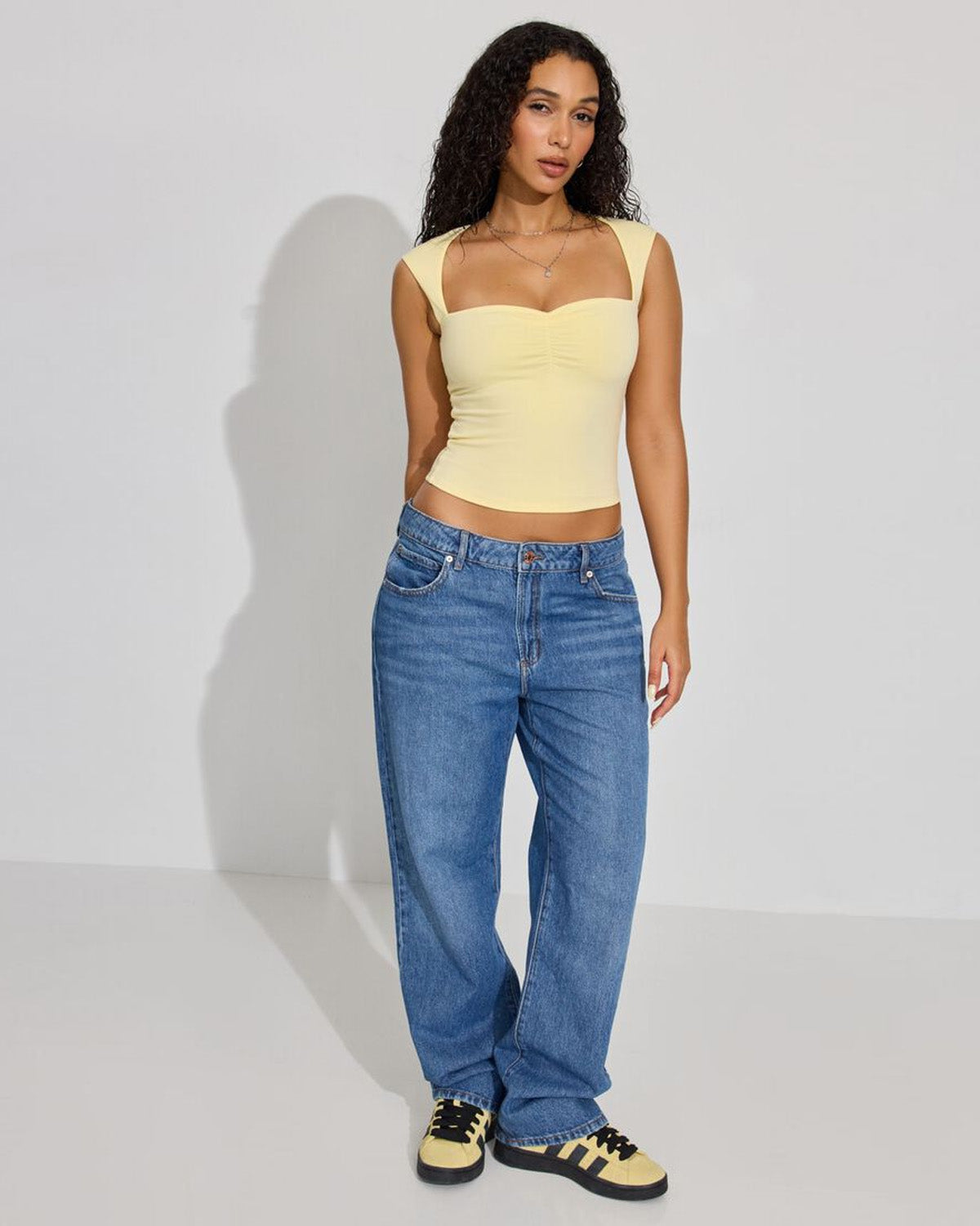topwear,tops,casual,streetwear,knitted,single jersey,yellow,solid,slim fit,crop,crop,sweetheart neck,cap sleeves	24060027AB, OY647