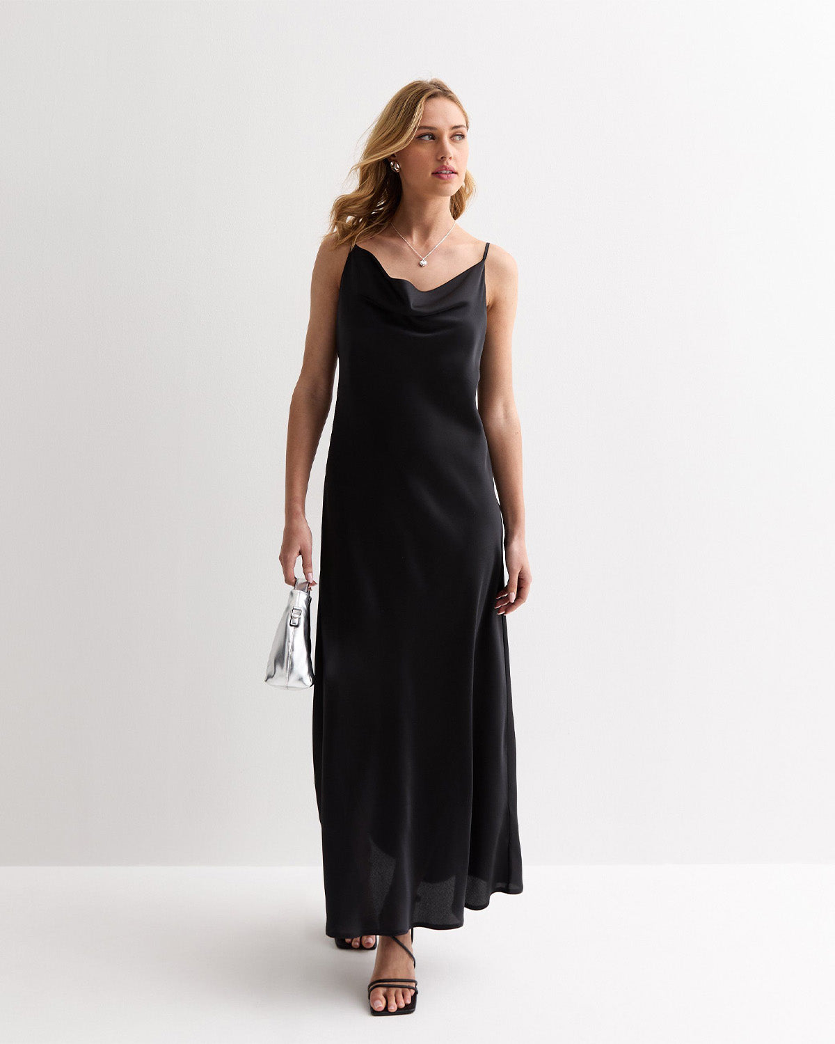 dresses,dresses,date night, party, statement, vacation,bold, glam, summer,woven,satin,black,solid,regular fit,slip,maxi,cami neck,spaghetti strap,sleeveless,Color: Black
Fabric: Satin
Type: Slip Dress
Fit: Relaxed Fit
Length: Maxi
Neck: Cami Neck
Strap: Spaghetti Strap
Print: Solid,SATIN MAXI SLIP DRESS IN BLACK,satin-maxi-slip-dress-in-black-black-oy1214