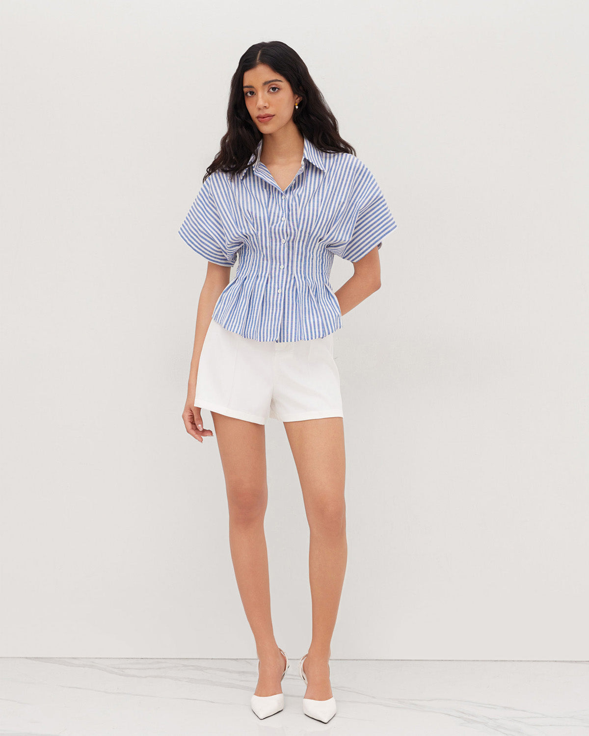 topwear,tops,casual, outdoor events,minimal, summer, streetwear,woven,linen,printed,blue,color block, pinstripes,pleated, pinstripes,button,tailored fit,fit and flare,waist length,curved hem,shirt collar,batwing sleeve,short sleeves	25060048GG,OY2016