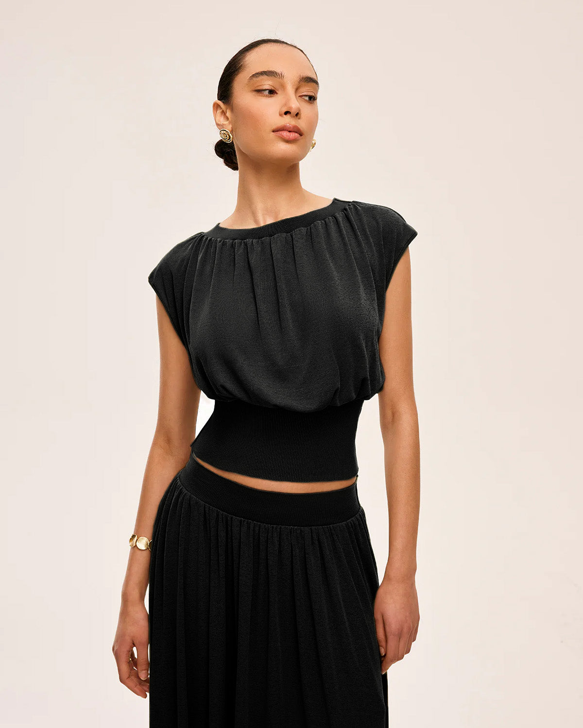 coord sets,bottomwear, topwear,casual chic, vacation, outdoor events, minimal, summer, urban fit, ,knitted,crepe,gathers,black,solid,fabric gathers,,,slim fit top,waist fitted top,waist length top,straight hem,crew neck,no straps ,short sleeves,cap sleeves,slip on,skirts,flare  skirt,full length,straight hem,mid rise waist,no pockets,OY3061, 25070030GG
