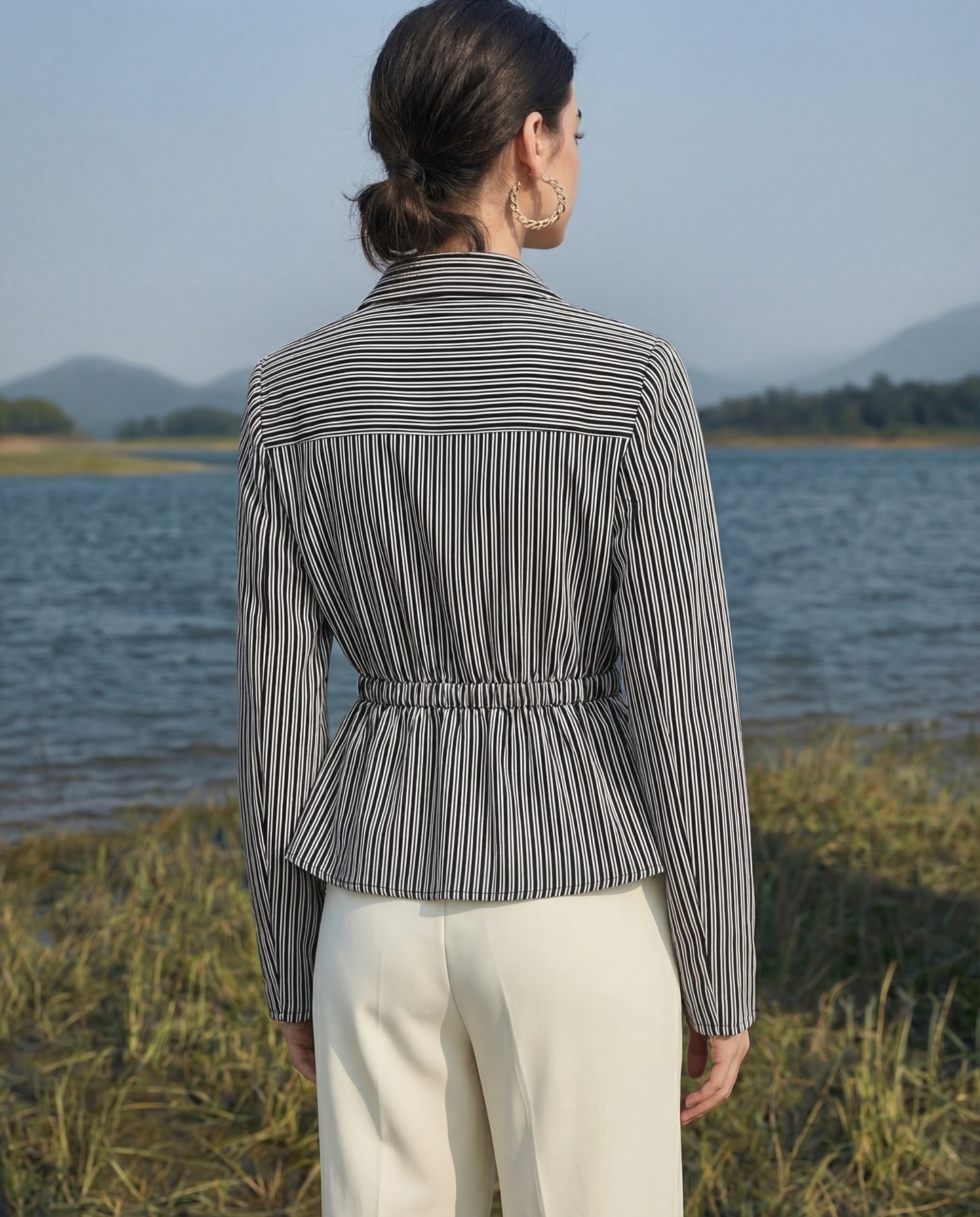 Black pinstripe shirt for women's office wear with tailored fit and breathable fabric, effortless styling for full day comfort
