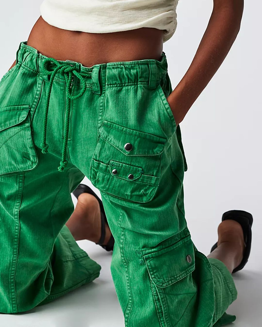 flap-pocket-cargo-green,FLAP-POCKET CARGO,Color: Green
Fabric: Cotton
Fit: Relaxed Fit 
Type: Wide Leg
Length: Ankle Length(36 in)
Waist: Low Rise
Closure: Button & Zipper
No. of Pockets: 9
Print: Solid,bottomwear,cargos,casual,streetwear,woven,cotton,green,flap pocket, multi pocket,relaxed fit,wide leg,ankle length,low rise