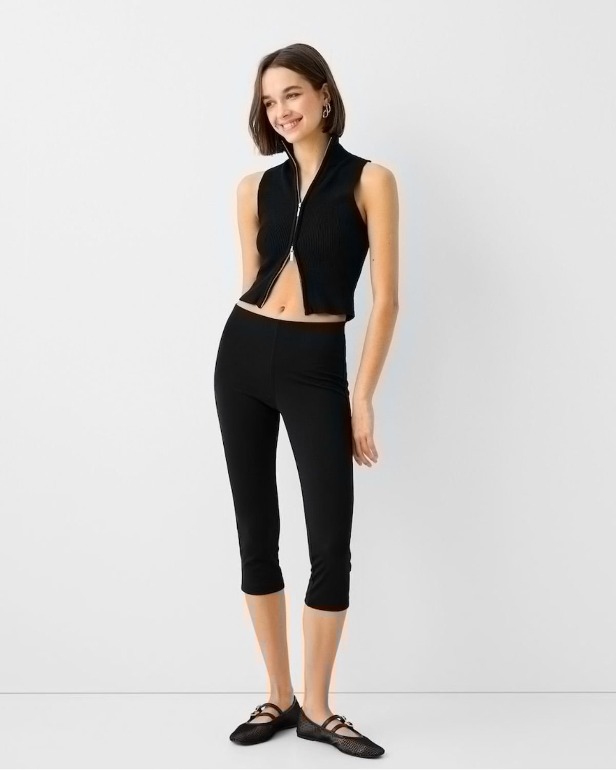 zip-up-fitted-top,ZIP-UP FITTED TOP,topwear,tops,casual,streetwear,knitted,ribbed,black,solid,zipper,slim fit,fitted,regular,high neck,sleeveless
