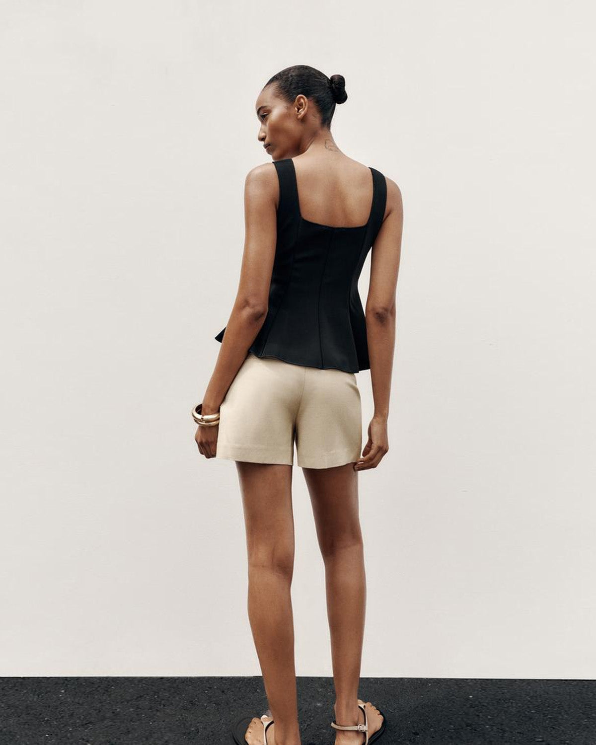 topwear,tops,semi-formal,statement piece,knitted,polyester, spandex,black,solid,panelling,button, golden trims,slim fit,vest,waist length,flounce hem,diamond neck,shoulder strap,no sleeves,sleeveless, OY2177, 25090044GG