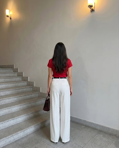 Red waist fitted shirt with white pants with Belt