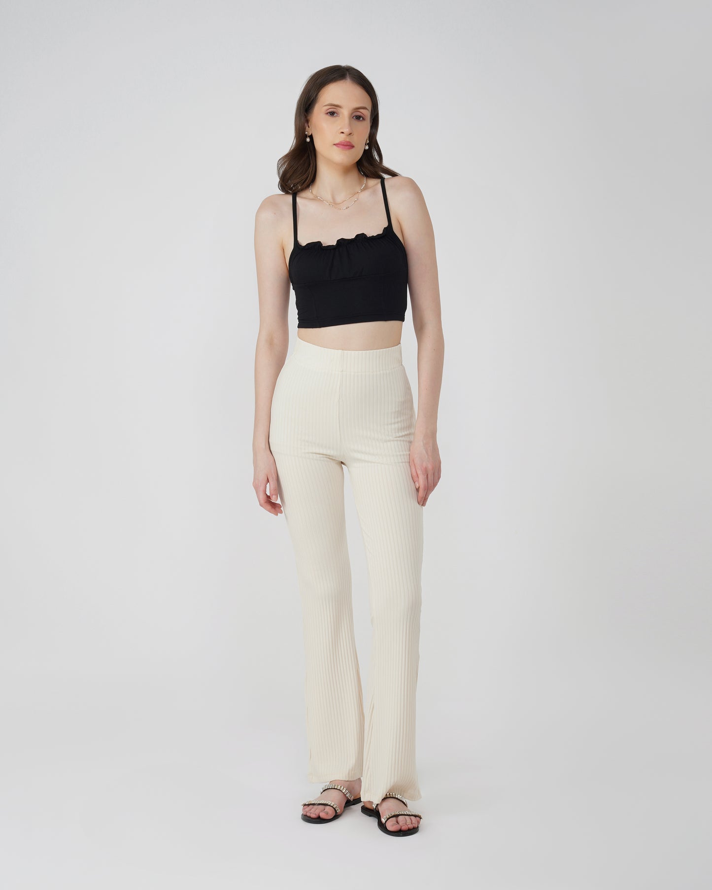 RIBBED FLARED TROUSER,Color: Cream
Fabric: Ribbed 
Fit: Flared Fit 
Length: Full Length (43 inches)
Waist: High Rise
Print: Solid
Details: Ribbed Surface,bottomwear,trousers,casual,knitted,ribbed,cream,flared fit,flared,full length,flared,high rise,suited for influencer,ribbed-flared-trouser-cream