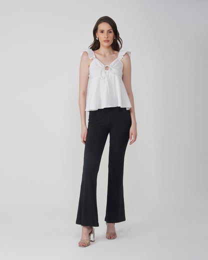 RIBBED FLARED TROUSER,Color: Black
Fabric: Ribbed
Fit: Flared Fit 
Length: Full Length (43 inches)
Waist: High Rise
Print: Solid
Details: Ribbed Surface,bottomwear,trousers,casual,knitted,ribbed,black,flared fit,flared,full length,flared,high rise,suited for influencer,ribbed-flared-trouser-black