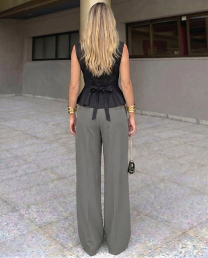 Black Buttoned Peplum Top and Grey Corset Waist pants