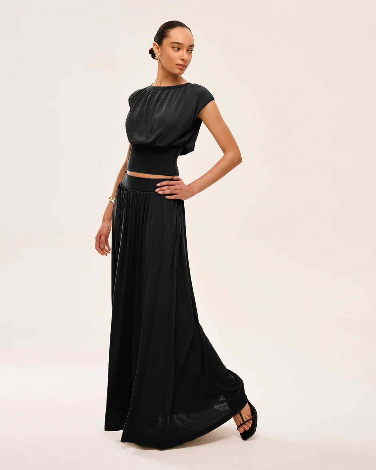 coord sets,bottomwear, topwear,casual chic, vacation, outdoor events, minimal, summer, urban fit, ,knitted,crepe,gathers,black,solid,fabric gathers,,,slim fit top,waist fitted top,waist length top,straight hem,crew neck,no straps ,short sleeves,cap sleeves,slip on,skirts,flare  skirt,full length,straight hem,mid rise waist,no pockets,OY3061, 25070030GG