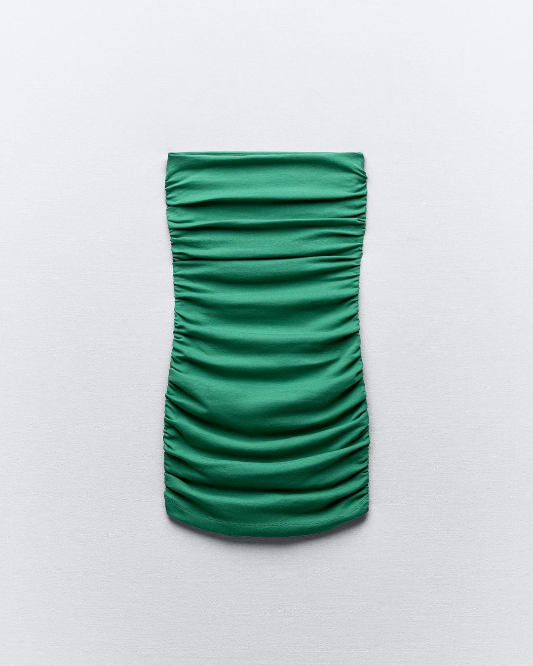 ruched-tube-dress-green,RUCHED TUBE DRESS,Color: Green
Fabric: Ribbed 
Type: Tube
Fit: Skinny Fit
Length: Mini
Neck: Off-Shoulder
Print: Solid 
Detail: Ruched  ,dresses,dresses,party,streetwear,knitted, stretchable,ribbed,green,solid,ruched,skinny fit,tube,mini,off shoulder neck,sleeveless,Manufacturing batch1_June19