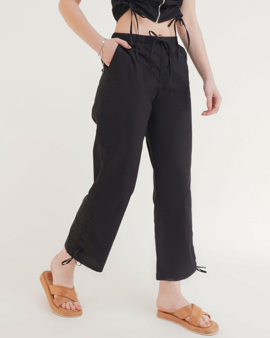 RUCHED COORD SET - TROUSERS,ankle length, black, bottomwear, casual, coord sets, cotton, drawstring, high rise, pants, relaxed fit, ruched, streetwear, summer, wide leg, woven,wide-leg-ruched-pants-black,Color- BlackFabric- CottonType- Wide LegFit- Relaxed Fit Length- Ankle LengthWaist- High RiseClosure- Zip &amp; ButtonNo. of Pockets- 2Detail- Drawstring Hem
Contains only Pants