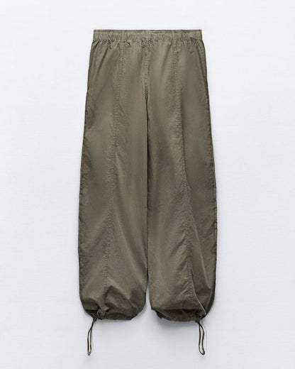 PARACHUTE PANTS,baggy fit, bottomwear, casual, cotton, drawstring, full length, mid rise, olive green, parachutes, streetwear, woven,parachute-pants-olivegreen,Color- Olive Green
Fabric- Cotton
Fit- Baggy Fit 
Length- Full Length (41in)
Waist- High Rise
Hem- Drawstring Hem
Closure- Elasticated waist
No. of Pockets- 2
Print- Solid