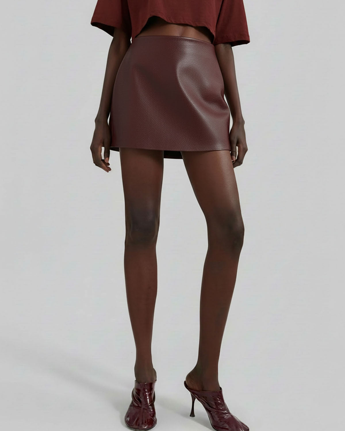 bottomwear,skirts,casual chic, outdoor events, party, vacation,gen z, summer,woven,pu leather,maroon,textured,zipper,a line fit,mini skirt,mini length,straight hem,mid rise, OY2230, 25090057GG