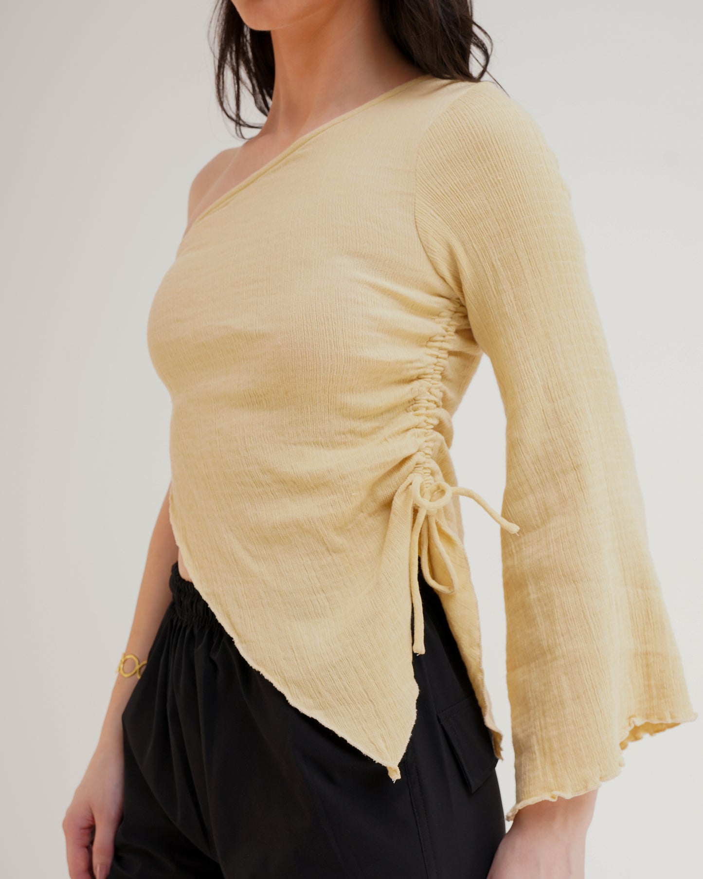 ONE SHOULDER CRINKLED TOP,asymmetric, beach, beige, casual, drawstring, fitted, knitted, long sleeves, one shoulder, polyamide, regular, slim fit, solid, streetwear, stretchable, summer, textured, tops, topwear, vacation,one-shoulder-crinkled-top-beige,Color- Beige
Fabric- Stretch Knit 
Type- Fitted 
Fit- Slim Fit 
Length- Regular
Sleeves- One Shoulder
Hem- Asymmetric Hem
Print- Solid
Details- Crinkled Fabric