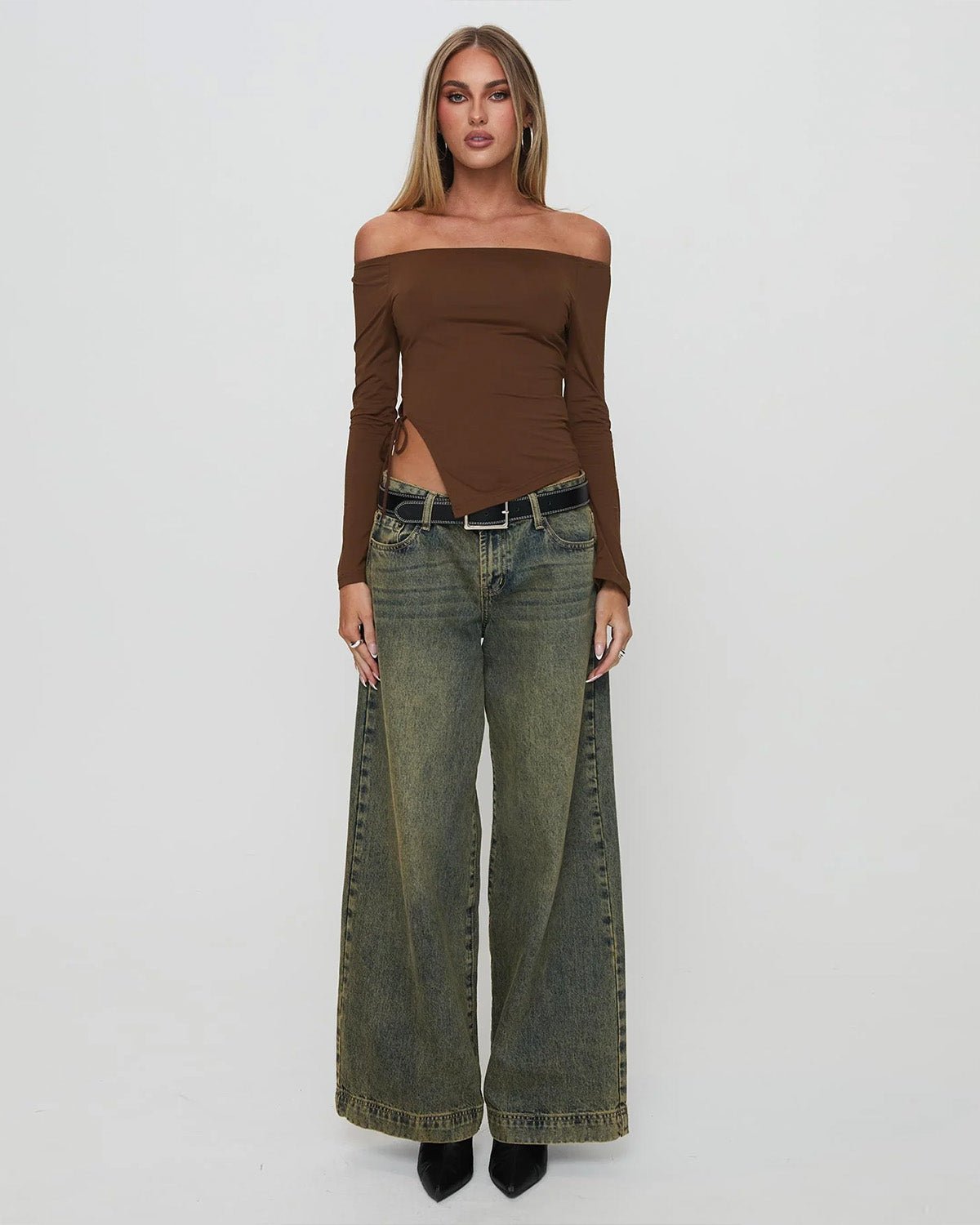 side-slit-off-shoulder-brown-top-brown-oy1508,25010008GG52,topwear,tops,vacation, outdoor events,bold, glam, streetwear,knitted,ribbed,brown,solid,slit,slim fit,fitted,regular,slit hem,off shoulder,long sleeves,Color: Brown
Fabric: Ribbed
Fit: Slim Fit 
Length: Regular
Neck: Off Shoulder
Sleeve: Long Sleeves
Print: Solid
Detail: Side slit with a drawstring tie knot,SIDE SLIT OFF SHOULDER BROWN TOP