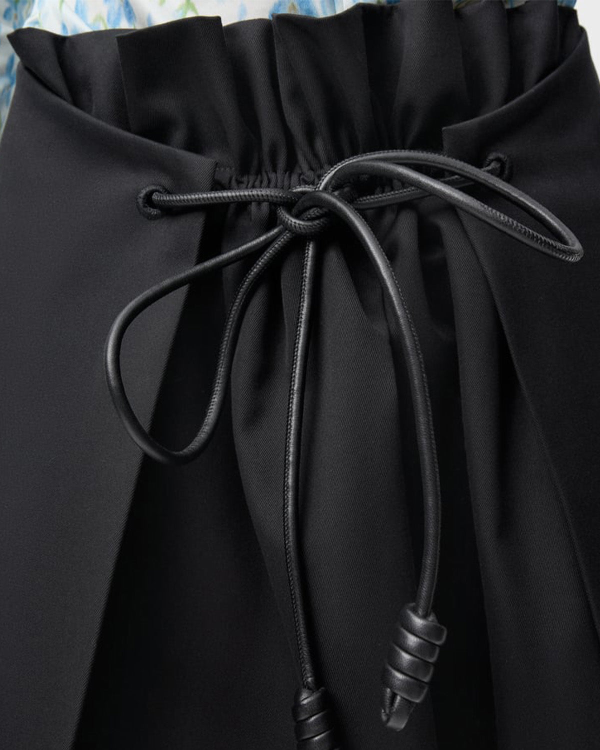 bottomwear,skirts,casual chic, vacation,gen z, glam, summer, streetwear,woven,cotton twill,panelling,black,panelled, tie knot,drawstring,relaxed fit,mini skirt,mini,flared,mid rise, 25080011GG, OY2172
