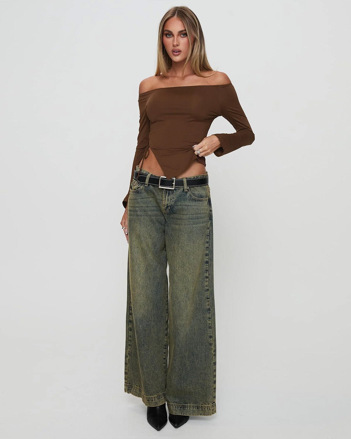 side-slit-off-shoulder-brown-top-brown-oy1508,25010008GG52,topwear,tops,vacation, outdoor events,bold, glam, streetwear,knitted,ribbed,brown,solid,slit,slim fit,fitted,regular,slit hem,off shoulder,long sleeves,Color: Brown
Fabric: Ribbed
Fit: Slim Fit 
Length: Regular
Neck: Off Shoulder
Sleeve: Long Sleeves
Print: Solid
Detail: Side slit with a drawstring tie knot,SIDE SLIT OFF SHOULDER BROWN TOP