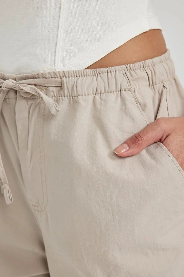 UNISEX CARGO PARACHUTE PANTS,bottomwear, casual, cotton, cream, drawstring, flap pocket, full length, high rise, parachutes, relaxed fit, streetwear, summer, wide leg, woven,unisex-parachute-cargo-trousers-cream,Length- Full length<br data-mce-fragment="1">Waist- High Waist<br data-mce-fragment="1">Fit- Wide Leg<br data-mce-fragment="1">Color- Cream<br data-mce-fragment="1">No. of Pockets- 5<br data-mce-fragment="1">Closure- Zip &amp; Button with Drawstrings<br data-mce-fragment="1">