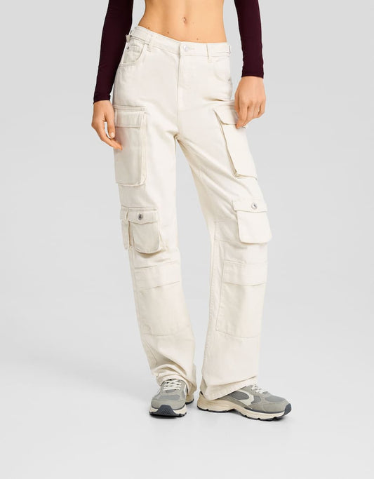 MULTI-POCKET STRAIGHT CARGO,bottomwear, cargos, cotton twill, flap pocket, full length, high rise, multi pocket, off white, straight fit, streetwear, summer, vacation, woven,cargo-multi-pocket-straight-fit-trouser,Length - Full length Waist - High-rise waist Fit - Straight fit Color - Optic white No. of Pockets - 12Material - Cotton twillLength - 42 inchClosure - Zip &amp; button Detail - Utility pocket