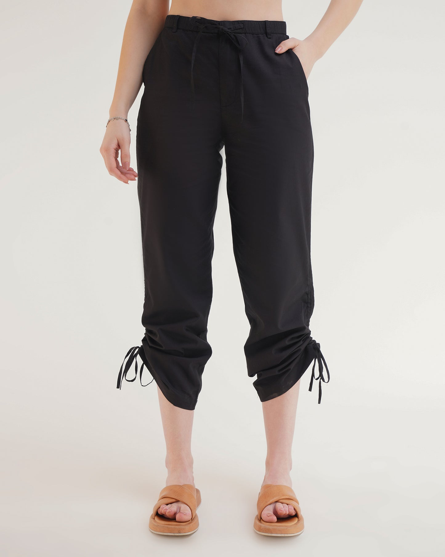 RUCHED COORD SET - TROUSERS,ankle length, black, bottomwear, casual, coord sets, cotton, drawstring, high rise, pants, relaxed fit, ruched, streetwear, summer, wide leg, woven,wide-leg-ruched-pants-black,Color- BlackFabric- CottonType- Wide LegFit- Relaxed Fit Length- Ankle LengthWaist- High RiseClosure- Zip &amp; ButtonNo. of Pockets- 2Detail- Drawstring Hem
Contains only Pants