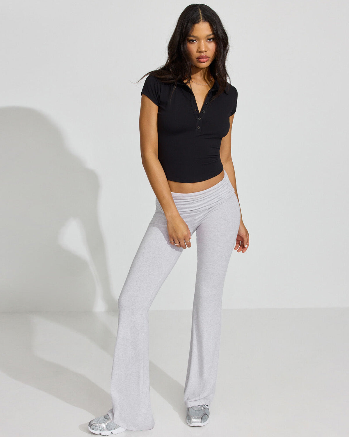 topwear,tops,casual, casual chic,gen z,, summer, streetwear,knitted, stretchable, woven,polyester, spandex,black,solid,,button, ,slim fit,crop top,crop, straight hem,spread collar,no straps,cap sleeves,short sleeves	OY3103, 25100008GG