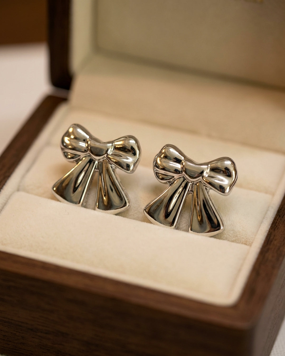 Designer earrings for women in silver finish