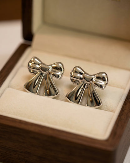 Designer earrings for women in silver finish