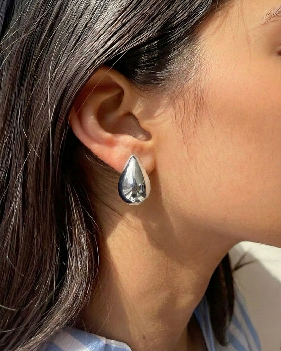 Mercury shaped drop earrings