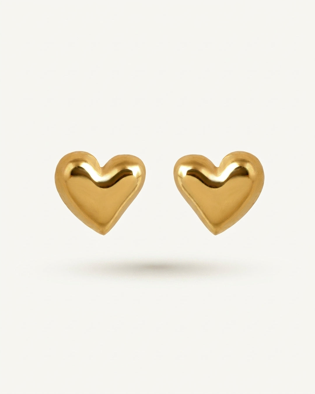 Heart shaped gold finish stud earrings online