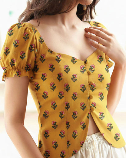 topwear,tops,ethnic, indo-western,ethnic wear, festive wear, indian wear, summer, casual,woven,poly cambric,printed,mustard yellow,floral print,slit in front,button ,skinny fit,slim fit top,waist length,curved hem,diamond neck,no straps,puff sleeves,short sleeves	OY2099, 25070053GG