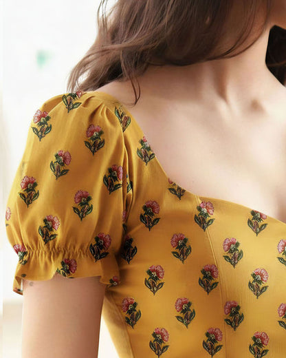 topwear,tops,ethnic, indo-western,ethnic wear, festive wear, indian wear, summer, casual,woven,poly cambric,printed,mustard yellow,floral print,slit in front,button ,skinny fit,slim fit top,waist length,curved hem,diamond neck,no straps,puff sleeves,short sleeves	OY2099, 25070053GG