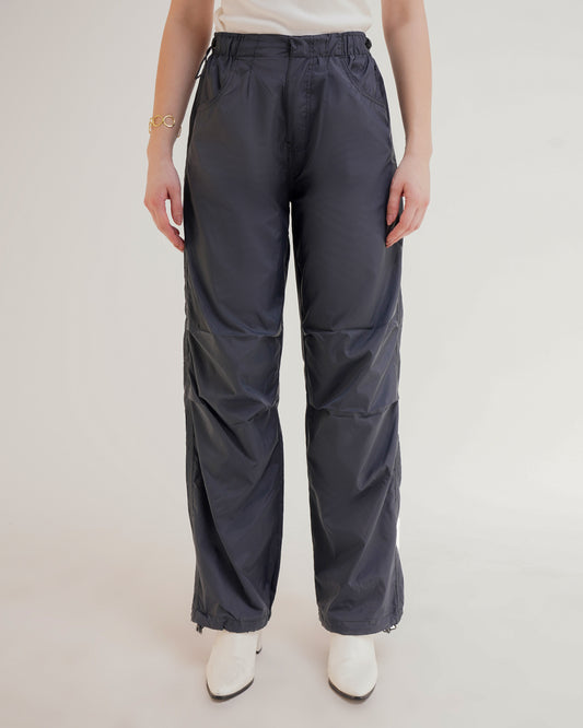 RELAXED FIT PARACHUTE PANTS,bottomwear, cargos, casual, dark blue, drawstring, full length, mid rise, parachutes, polyester, relaxed fit, streetwear, summer, woven,unisex-parachute-pants,Length- Full lengthWaist- High WaistFit- Wide LegColor- Dark Blue No. of Pockets- 2Closure- Zip, Snap Button &amp; Drawstring