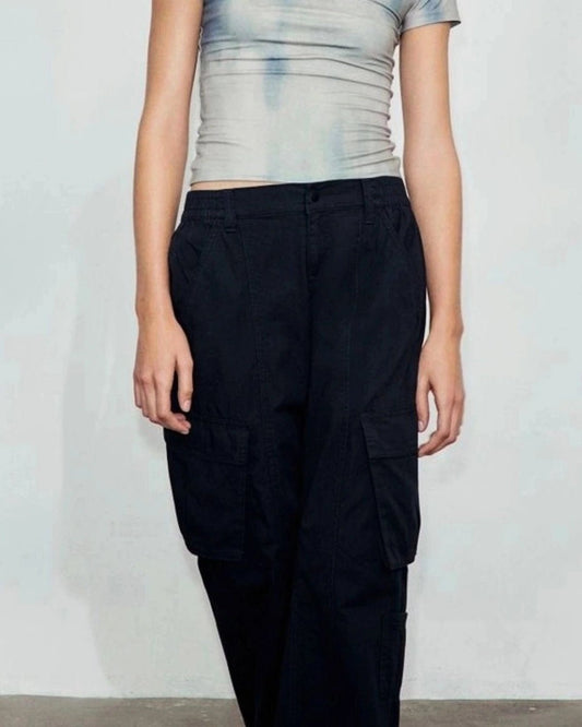 MID RISE STRAIGHT FIT CARGO,black, bottomwear, cargos, casual, cotton, full length, high rise, straight fit, streetwear, summer, utility pocket, woven,cargo-wide-leg-trouser-1-black,Length - Full length Waist - Mid-rise waist Fit - Wide leg fit Color - BlackNo. of Pockets - 4Material - Cotton BlendClosure - Zip &amp; button