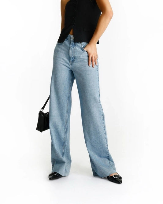 WIDE LEG FRAYED HEM WASHED JEANS,baggy fit, blue, bottomwear, casual, cotton, full length, high rise, jeans, streetwear, washed effect, washed jeans, wide leg, woven,wide-leg-washed-frayed-hem-jeans,Length - Full length Waist - High-rise waist Fit - Wide leg fit Color - Sky BlueNo. of Pockets - 4Material - Denim Length - 40-42 inch Closure - Zip &amp; button Detail - Washed effect and frayed hem