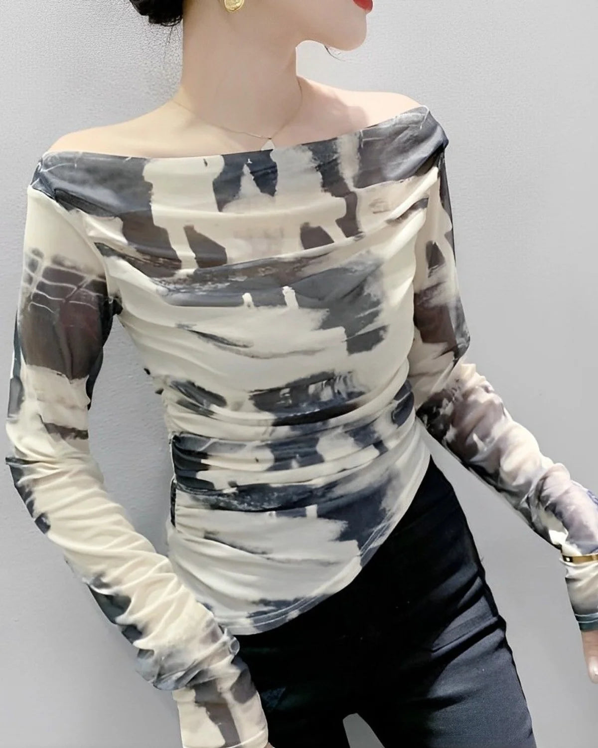 ABSTRACT PRINTED TOP,abstract, casual, fitted, knitted, long sleeves, mesh, multi colored, off shoulder neck, printed, regular, ruched, slim fit, streetwear, stretchable, summer, tops, topwear,abstract-printed-ruched-waist-top-whiteblack,Neck - Boat neckSleeve - Full sleevesFit - Slim fitPrint/Pattern - Abstract printedColor - White and blackMaterial - Lycra meshSize - Bust (32-40) inch