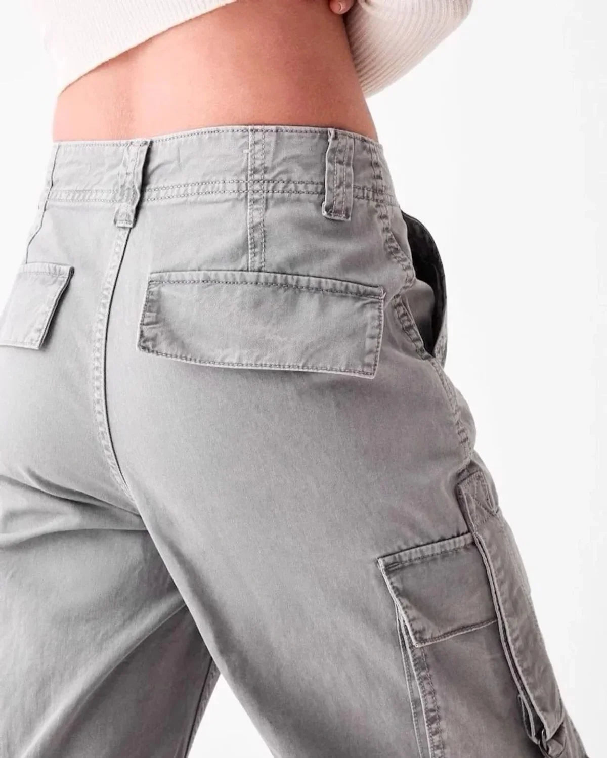 UNISEX MULTI POCKET CARGO,bottomwear, cargos, casual, cotton twill, flap pocket, full length, high rise, multi pocket, sliver grey, straight fit, streetwear, summer, woven,unisex-wide-cargo-trousers-copy,Length- Full lengthWaist- High WaistFit- Wide LegColor- Silver GreyNo.of Pockets- 6Closure- Zip &amp; Button