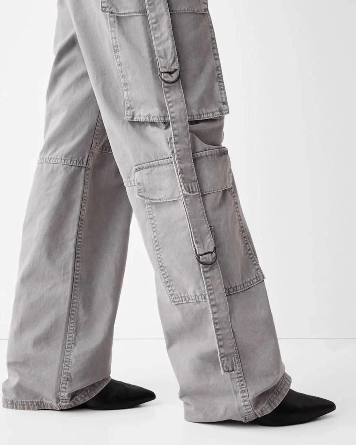 UNISEX MULTI POCKET CARGO,bottomwear, cargos, casual, cotton twill, flap pocket, full length, high rise, multi pocket, sliver grey, straight fit, streetwear, summer, woven,unisex-wide-cargo-trousers-copy,Length- Full lengthWaist- High WaistFit- Wide LegColor- Silver GreyNo.of Pockets- 6Closure- Zip &amp; Button