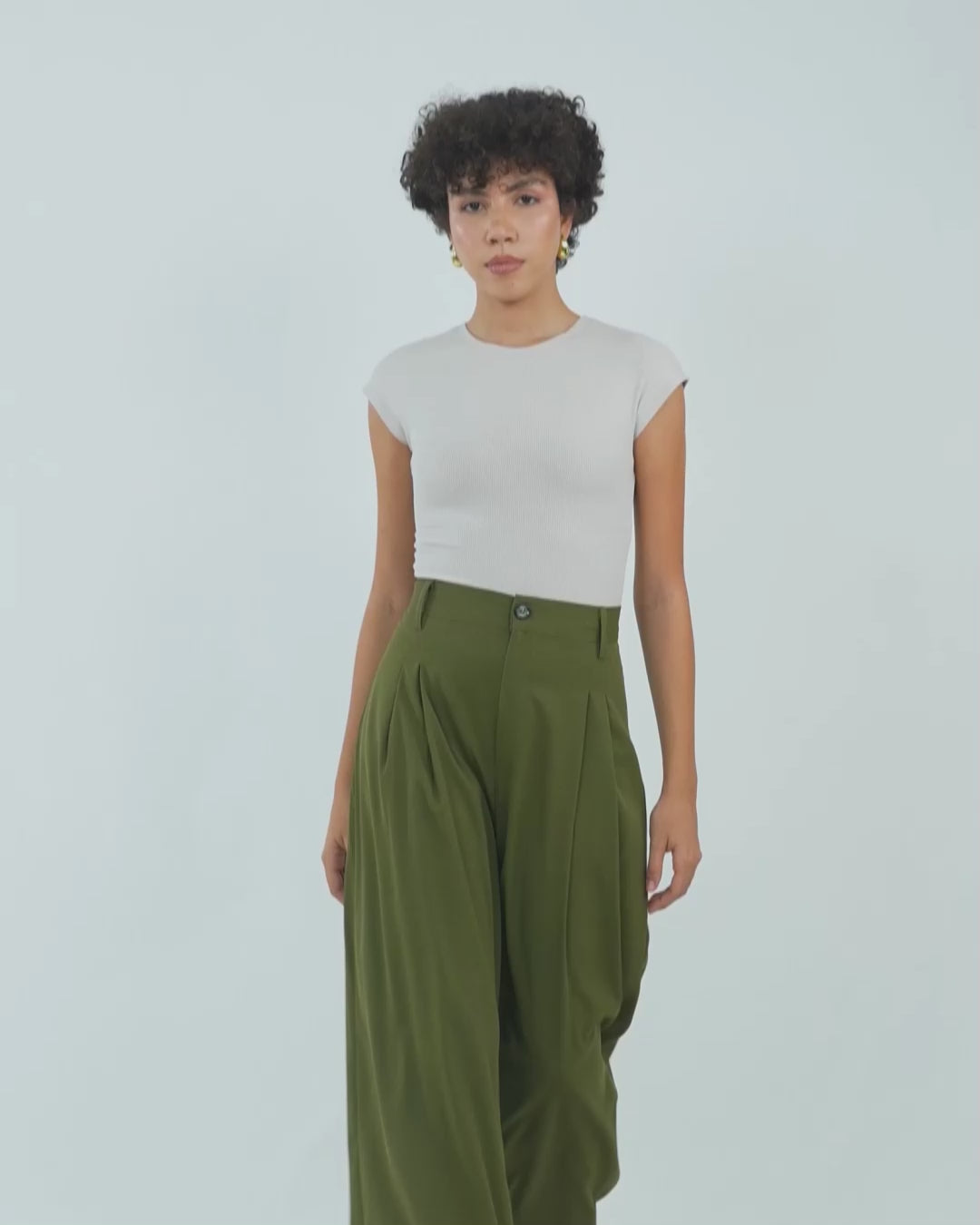 TWO PLEATED PANTS,Color: Olive Green
Fabric: Moss 
Type: Wide Leg
Fit: Relaxed Fit 
Length: Full Length
Waist: High Rise
Closure: Zip & Button
Print: Solid
Detail: Two Pleats,bottomwear,pants,semi-formal,workwear,woven,moss,olive green,pleated,Relaxed fit,wide leg,full length,high rise,Manufacturing batch1_June19,suited for influencer,two-pleated-pants-olive-green