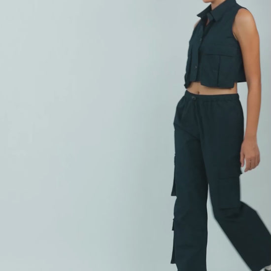 flap-pocket-co-ord-crop-shirt-black,FLAP POCKET CO-ORD CROP SHIRT,Color: BlackFabric: Cotton, PoplinFit: Regular Fit Length: CropNeck: CollaredSleeves: SleevelessClosure: Button-UpPrint: SolidDetails: Flap-Pocket,coord sets,tops,casual,streetwear,woven,cotton, poplin,black,solid,flap pocket, utility pocket,regular fit,crop,crop,collared,sleeveless,Manufacturing batch1_June19