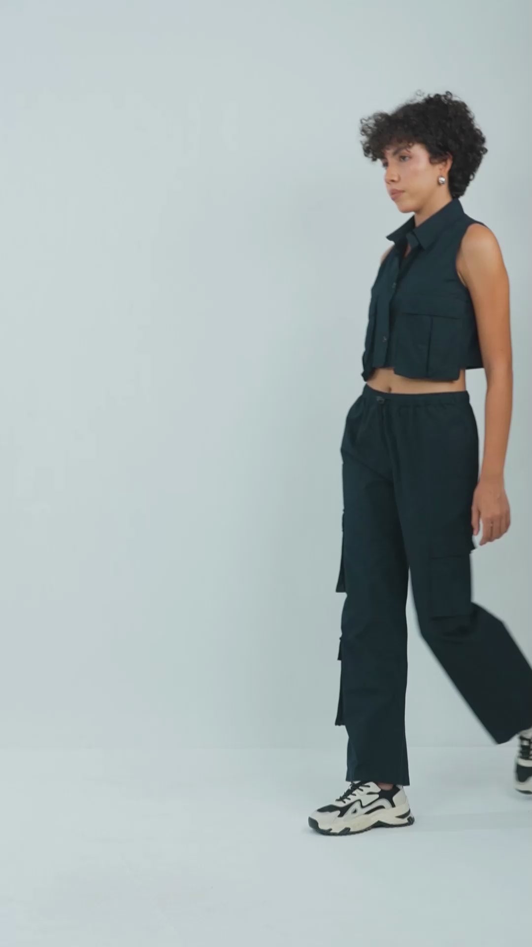 flap-pocket-co-ord-crop-shirt-black,FLAP POCKET CO-ORD CROP SHIRT,Color: BlackFabric: Cotton, PoplinFit: Regular Fit Length: CropNeck: CollaredSleeves: SleevelessClosure: Button-UpPrint: SolidDetails: Flap-Pocket,coord sets,tops,casual,streetwear,woven,cotton, poplin,black,solid,flap pocket, utility pocket,regular fit,crop,crop,collared,sleeveless,Manufacturing batch1_June19