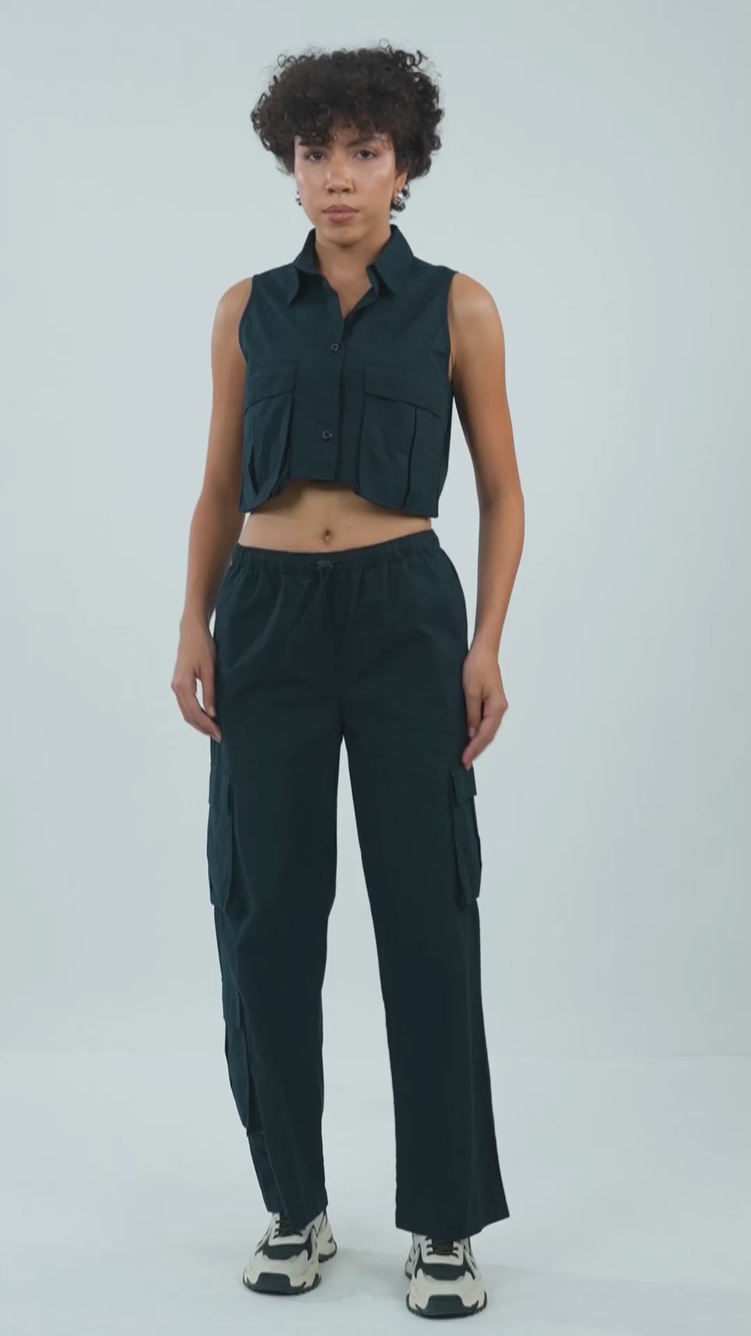 utility-pocket-parachute-pants-black,UTILITY-POCKET PARACHUTE PANTS,Color: BlackFabric: Cotton PoplinFit: Relaxed Fit Length: Full Length (39 in)Waist: Mid RiseClosure: Elasticated with drawstringNo. of Pockets: 5Print: SolidDetail: Flap pockets on sides,coord sets,parachutes,casual,streetwear,woven,cotton, poplin,black,flap pocket, utility pocket,relaxed fit,full length,drawstring,mid rise,Manufacturing batch1_June19