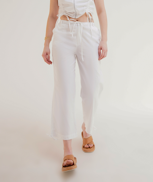 RUCHED COORD SET - TROUSERS,ankle length, bottomwear, casual, coord sets, cotton, drawstring, high rise, pants, relaxed fit, ruched, streetwear, summer, white, wide leg, woven,wide-leg-ruched-pants,Color- WhiteFabric- CottonType- Wide LegFit- Relaxed Fit Length- Ankle LengthWaist- High RiseClosure- Zip &amp; ButtonNo. of Pockets- 2Detail- Drawstring Hem
Contains only Pant